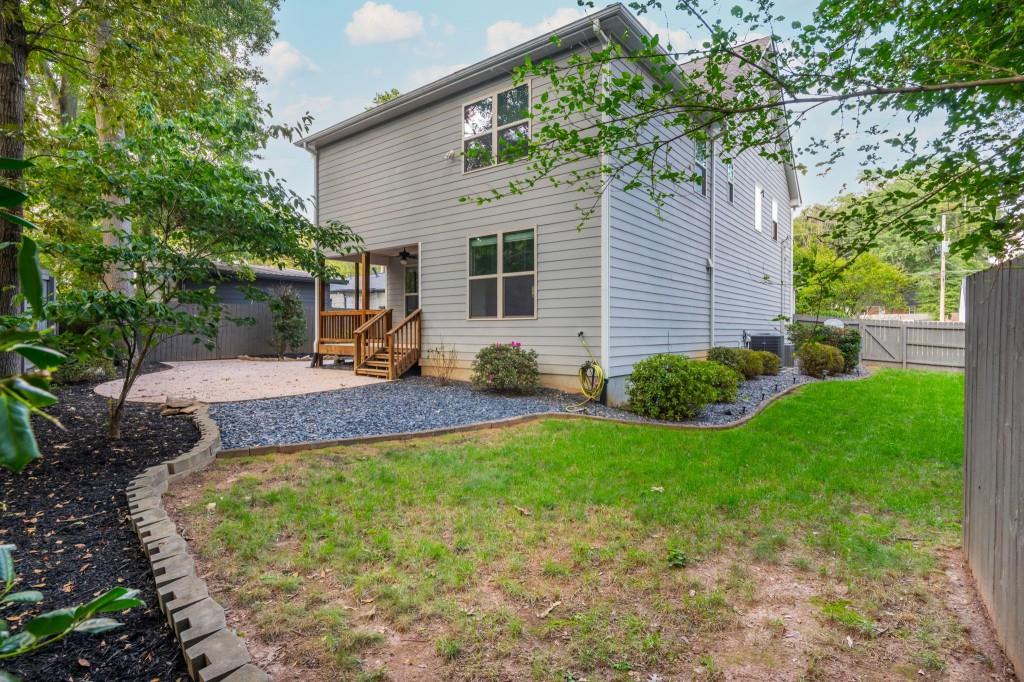 371 Hooper Street Southeast Atlanta, GA 30317 - Photo 26 of 29 a view of a house with backyard and a tree