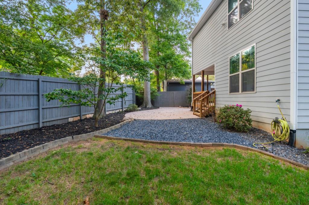 371 Hooper Street Southeast Atlanta, GA 30317 - Photo 27 of 29 a view of a backyard with a tree
