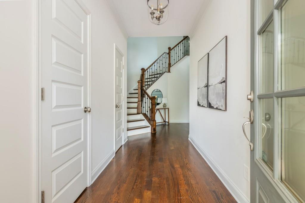 371 Hooper Street Southeast Atlanta, GA 30317 - Photo 3 of 29 a view of a hallway with wooden floor and staircase