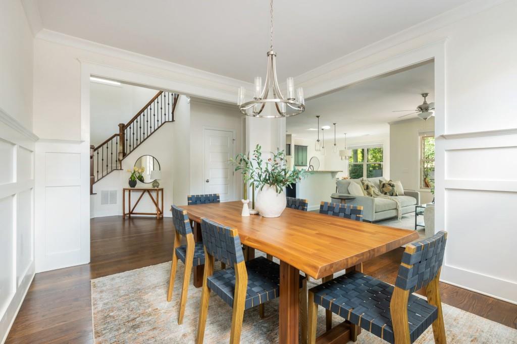 371 Hooper Street Southeast Atlanta, GA 30317 - Photo 6 of 29 a view of a dining room with furniture and wooden floor