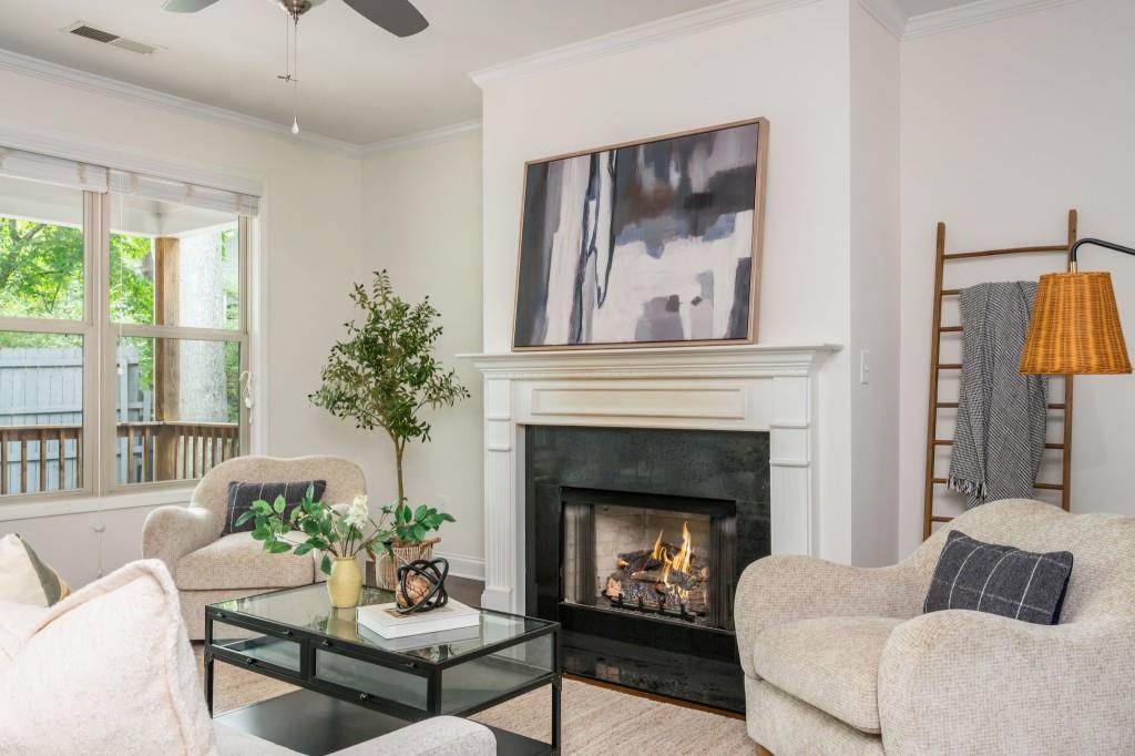 371 Hooper Street Southeast Atlanta, GA 30317 - Photo 9 of 29 a living room with furniture and a fireplace