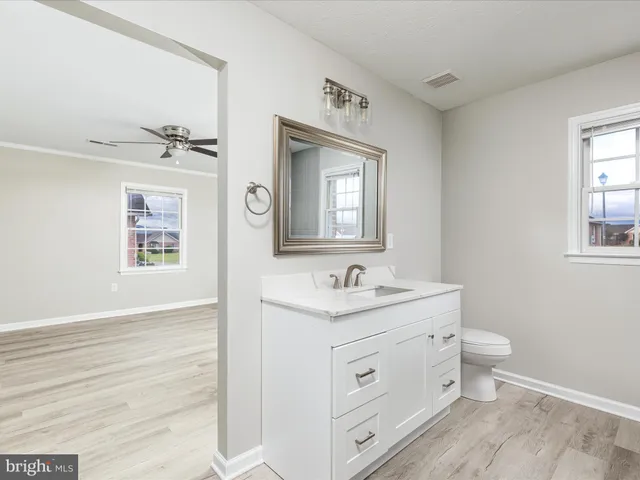 a view of an empty walk in closet