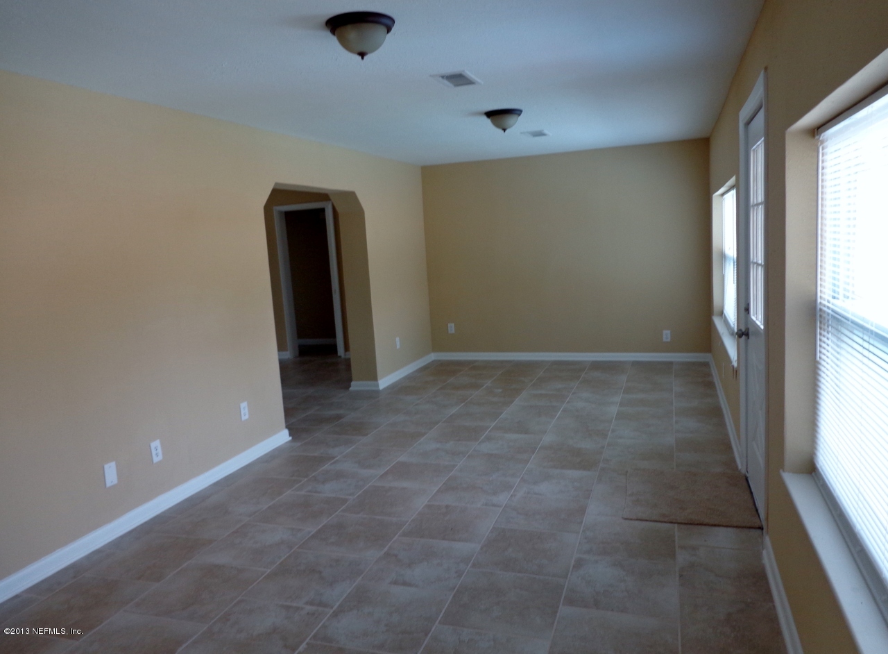 3857 Rogero Road Jacksonville, FL 32277 - Photo 9 of 24 family room