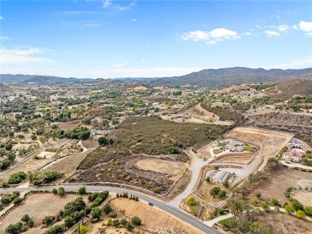 an aerial view of residential house and outdoor space