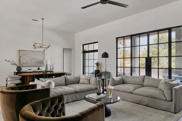 a living room with furniture and a window