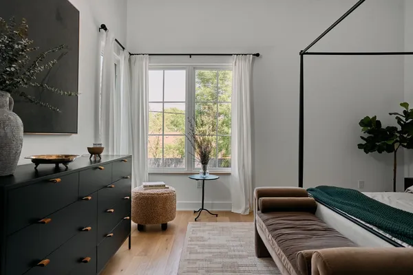 a utility room with cabinets dryer and washer