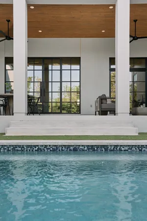 a view of a kitchen with a sink and a window