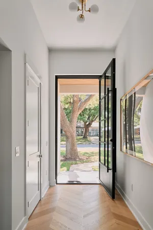 a view of an entryway with a door