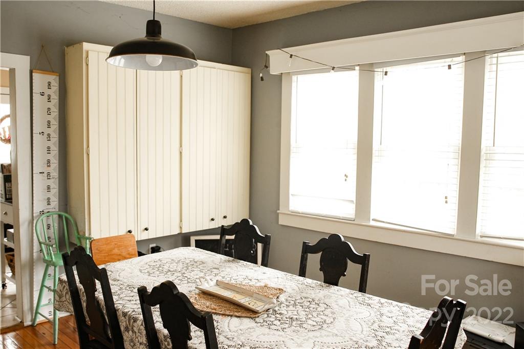 1052 Greenwood Road Spruce Pine, NC 28777 - Photo 19 of 43 a room with a table and chairs