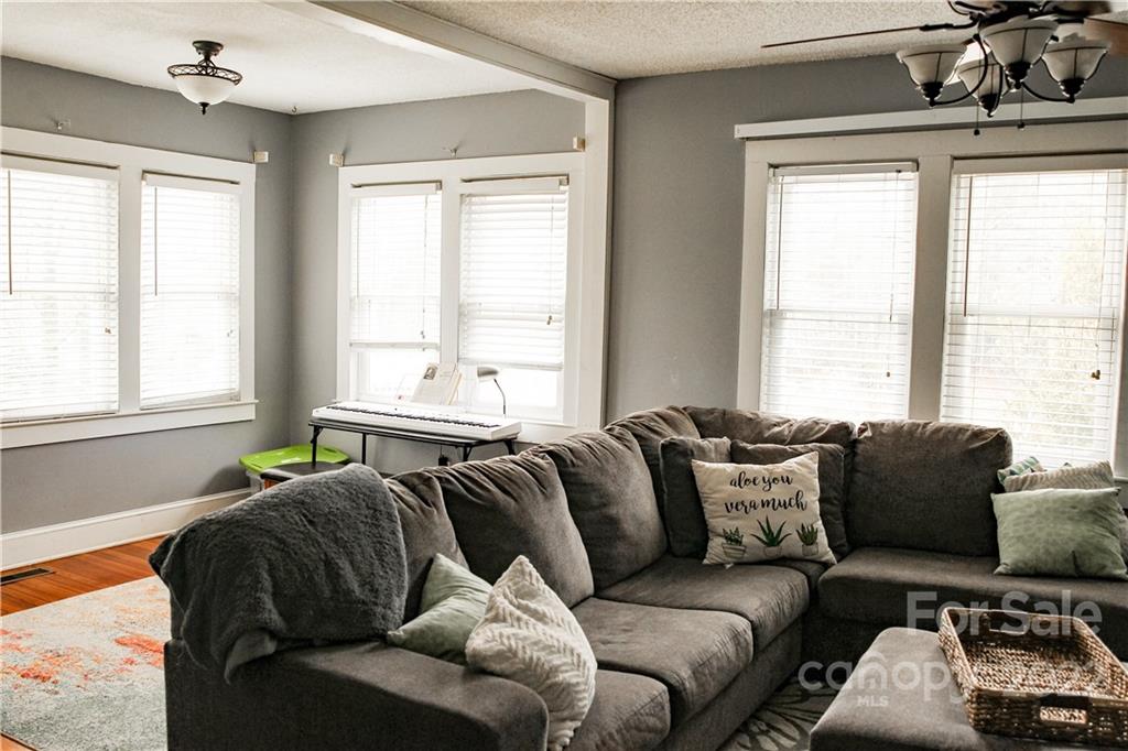 1052 Greenwood Road Spruce Pine, NC 28777 - Photo 22 of 43 a living room with furniture and windows