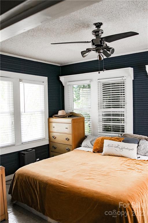 1052 Greenwood Road Spruce Pine, NC 28777 - Photo 28 of 43 a bedroom with a bed and a window