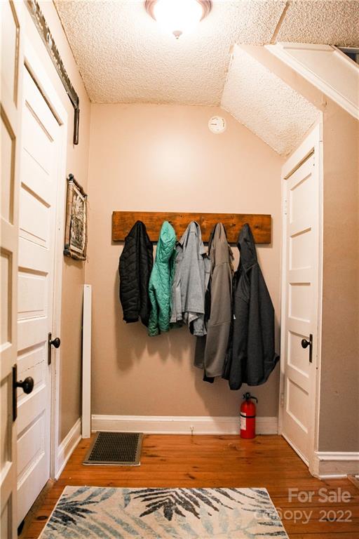 1052 Greenwood Road Spruce Pine, NC 28777 - Photo 30 of 43 a view of walk in closet with clothes and shoes