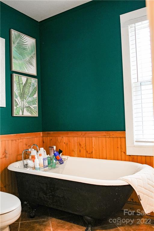 1052 Greenwood Road Spruce Pine, NC 28777 - Photo 33 of 43 a view of a bedroom with a bed and a window
