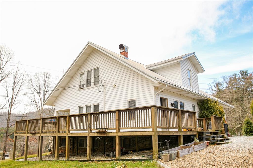 1052 Greenwood Road Spruce Pine, NC 28777 - Photo 4 of 43 a front view of a large white building