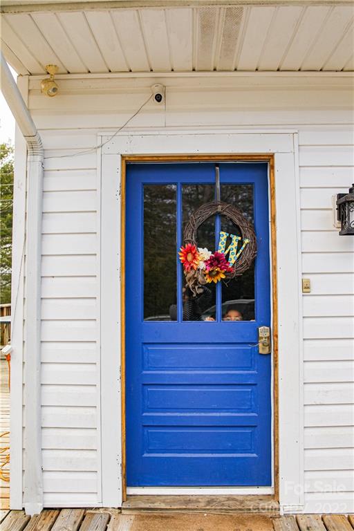 1052 Greenwood Road Spruce Pine, NC 28777 - Photo 5 of 43 a front view of a house with entryway