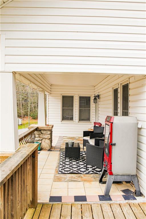 1052 Greenwood Road Spruce Pine, NC 28777 - Photo 7 of 43 workspace with wooden floor and windows