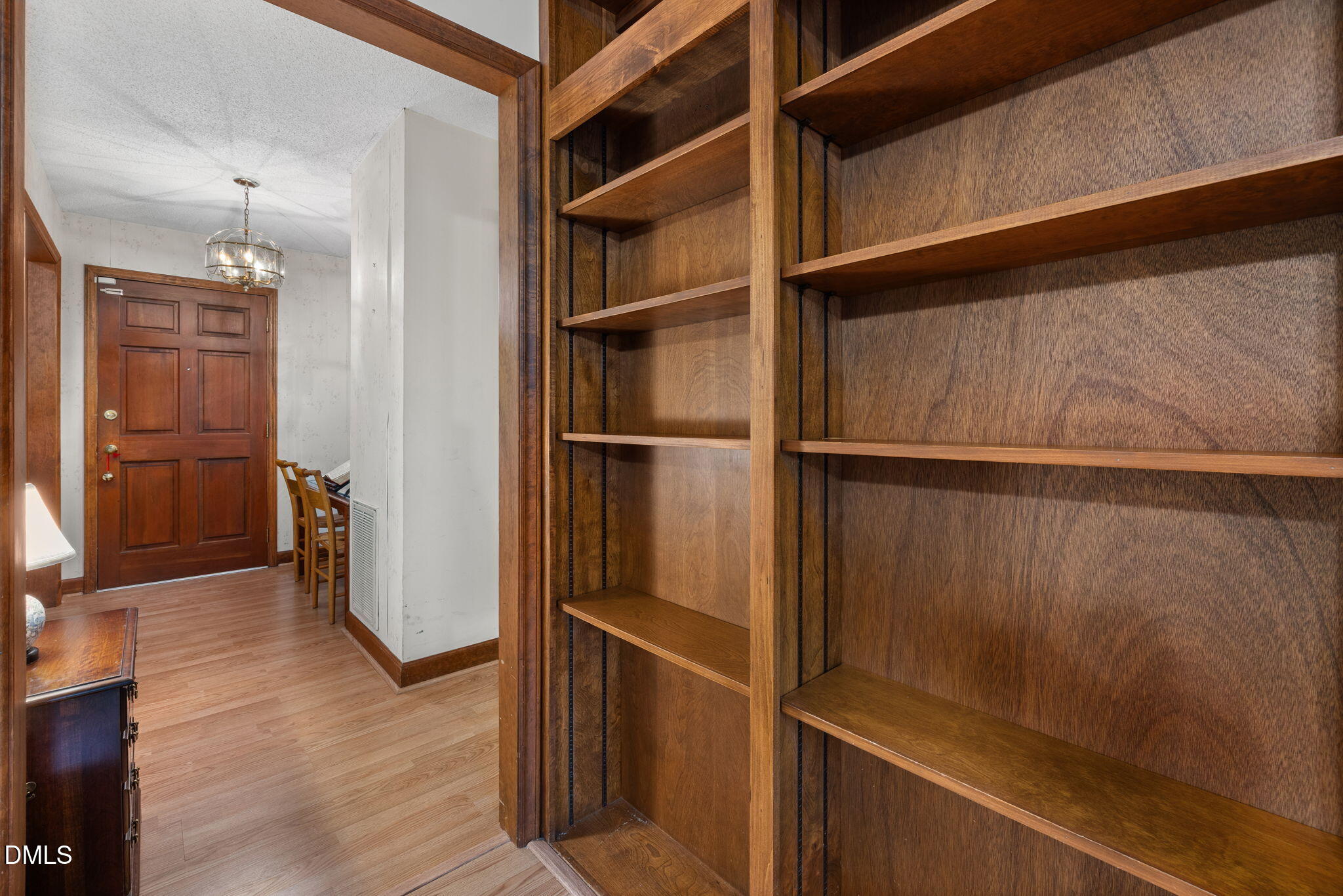 2024 Angier Road Fuquay-Varina, NC 27526 - Photo 15 of 35 a view of walk in closet with wooden floor