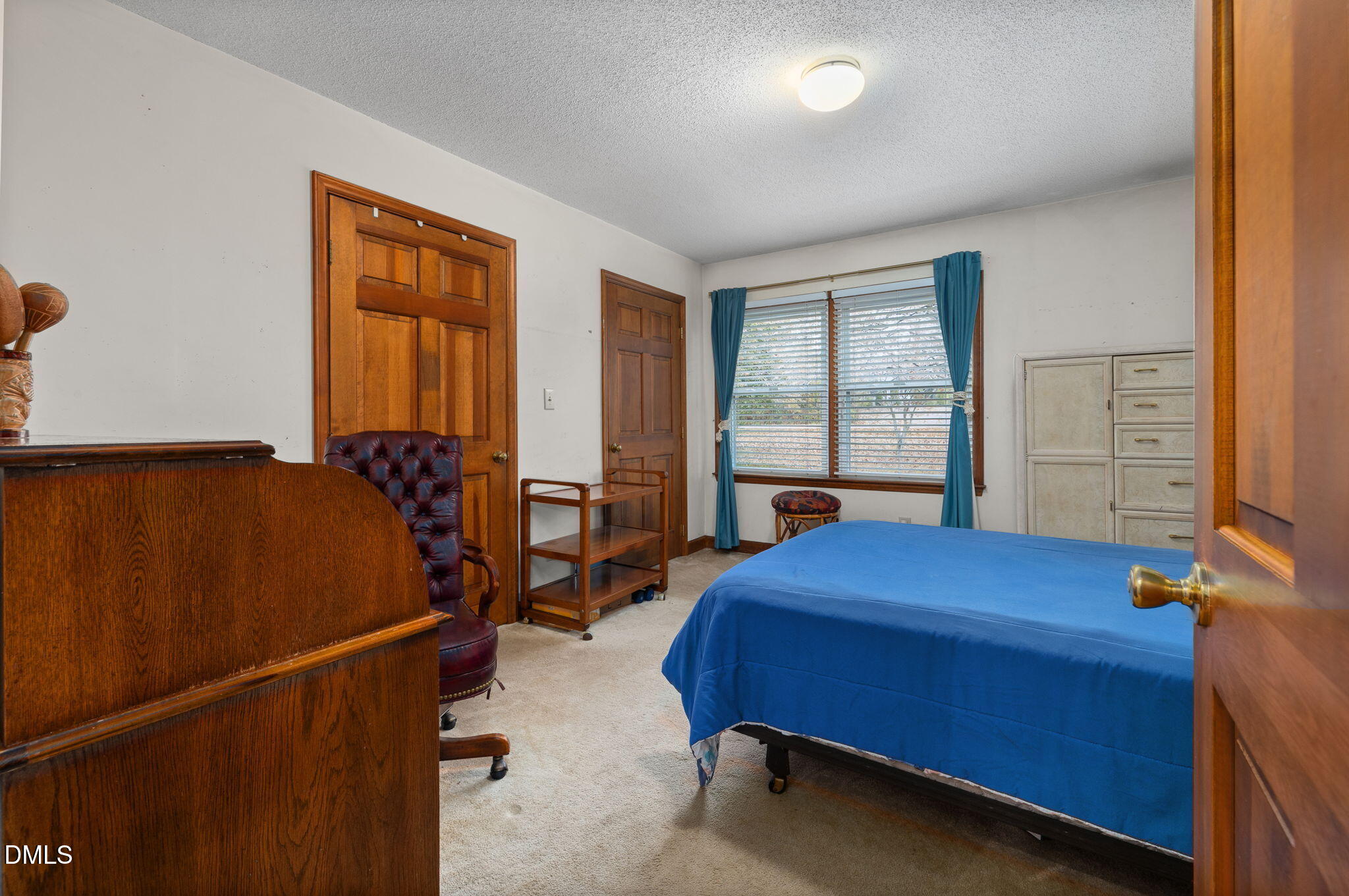 2024 Angier Road Fuquay-Varina, NC 27526 - Photo 17 of 35 a bed room with a bed and a window