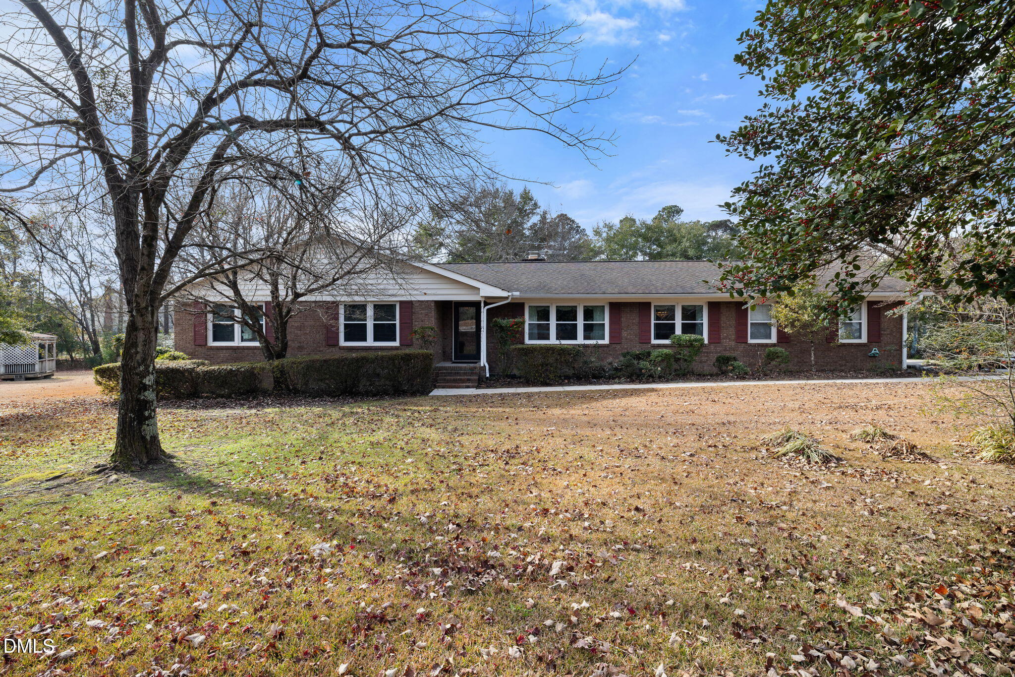 2024 Angier Road Fuquay-Varina, NC 27526 - Photo 2 of 35 a front view of a house with a yard