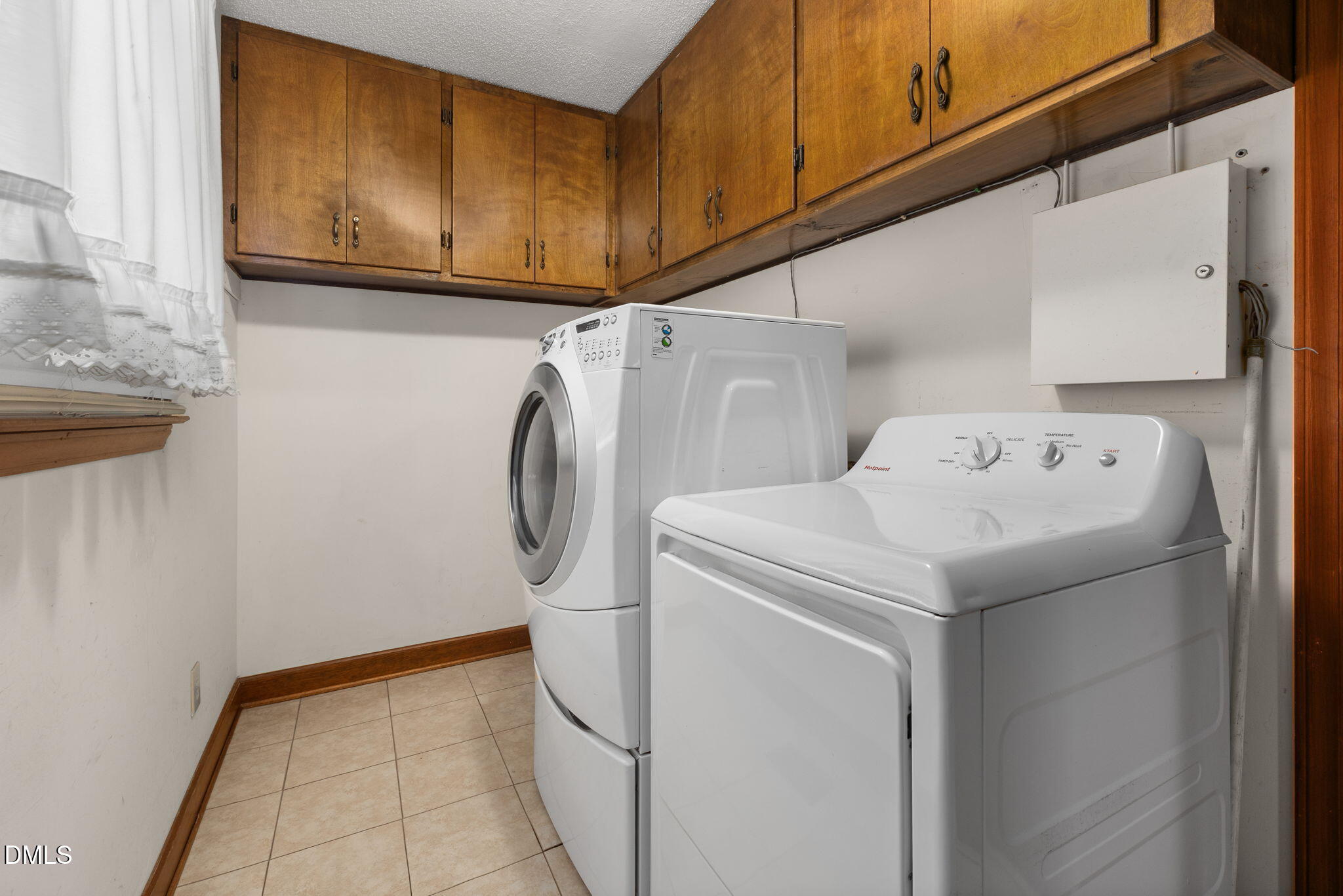 2024 Angier Road Fuquay-Varina, NC 27526 - Photo 25 of 35 a utility room with dryer and washer