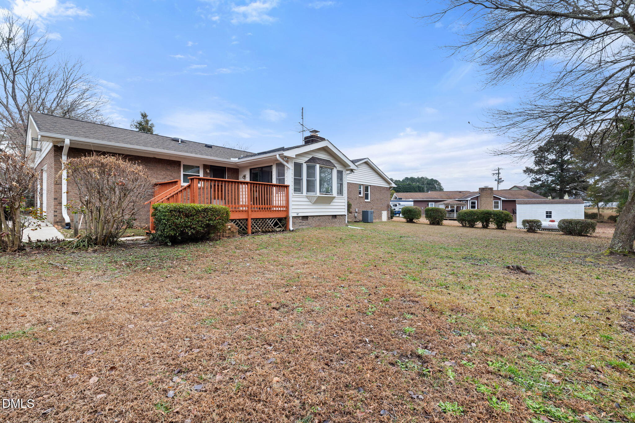 2024 Angier Road Fuquay-Varina, NC 27526 - Photo 31 of 35 a front view of a house with a yard and garage