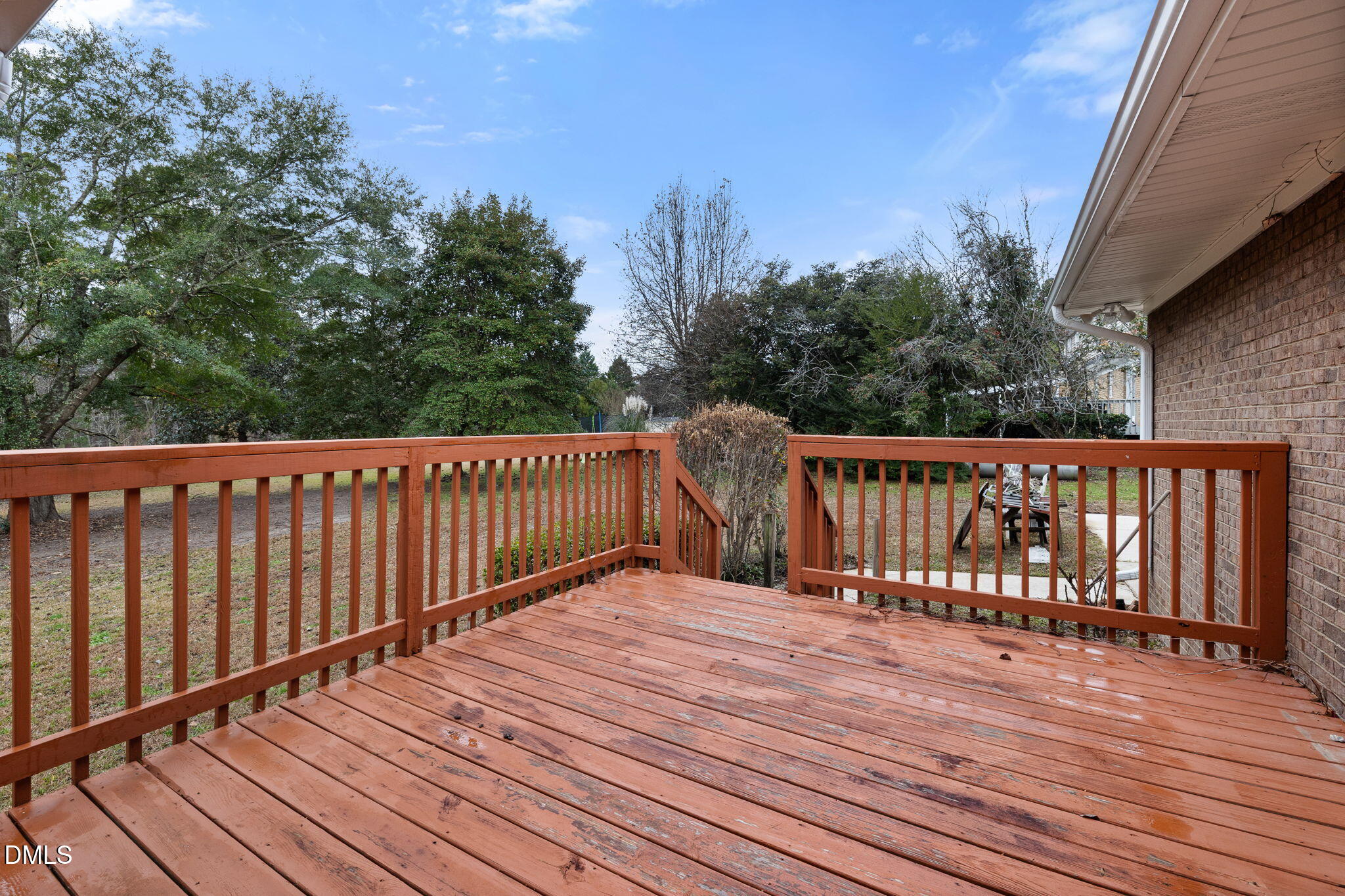 2024 Angier Road Fuquay-Varina, NC 27526 - Photo 33 of 35 a balcony view with wooden floor and fence