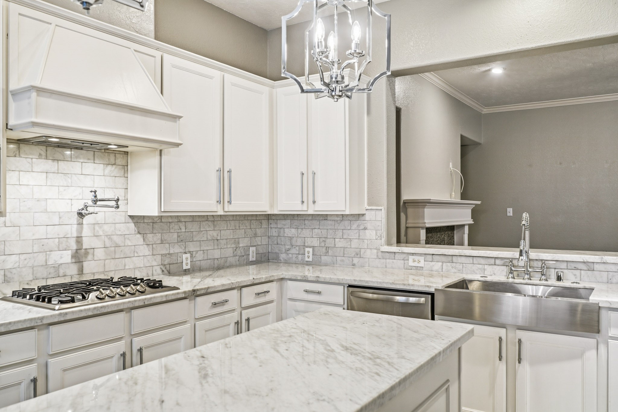 2711 Wallingford Pines Houston, TX 77042 - Photo 2 of 8 a kitchen with stainless steel appliances granite countertop a sink stove and cabinets