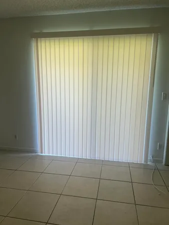 a view of a house with a back yard