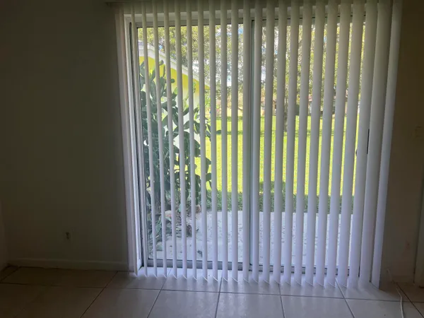 a view of a field with trees