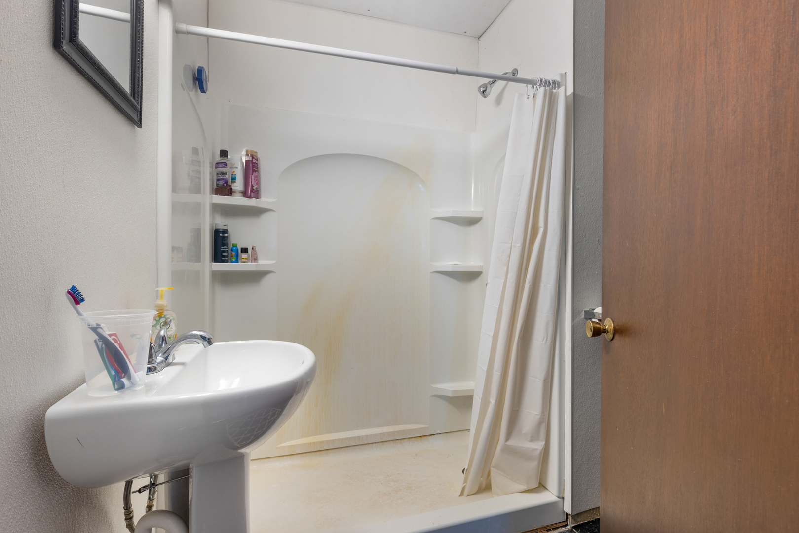 15419 Marengo Road Union, IL 60180 - Photo 11 of 21 a bathroom with a sink a mirror and shower