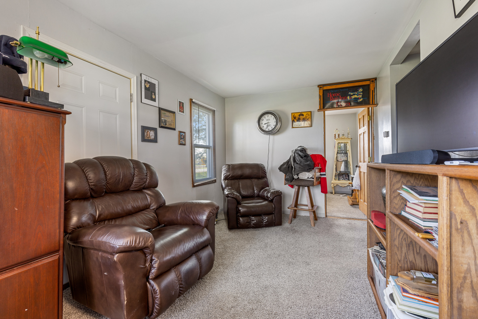 15419 Marengo Road Union, IL 60180 - Photo 8 of 21 a living room with furniture and a flat screen tv