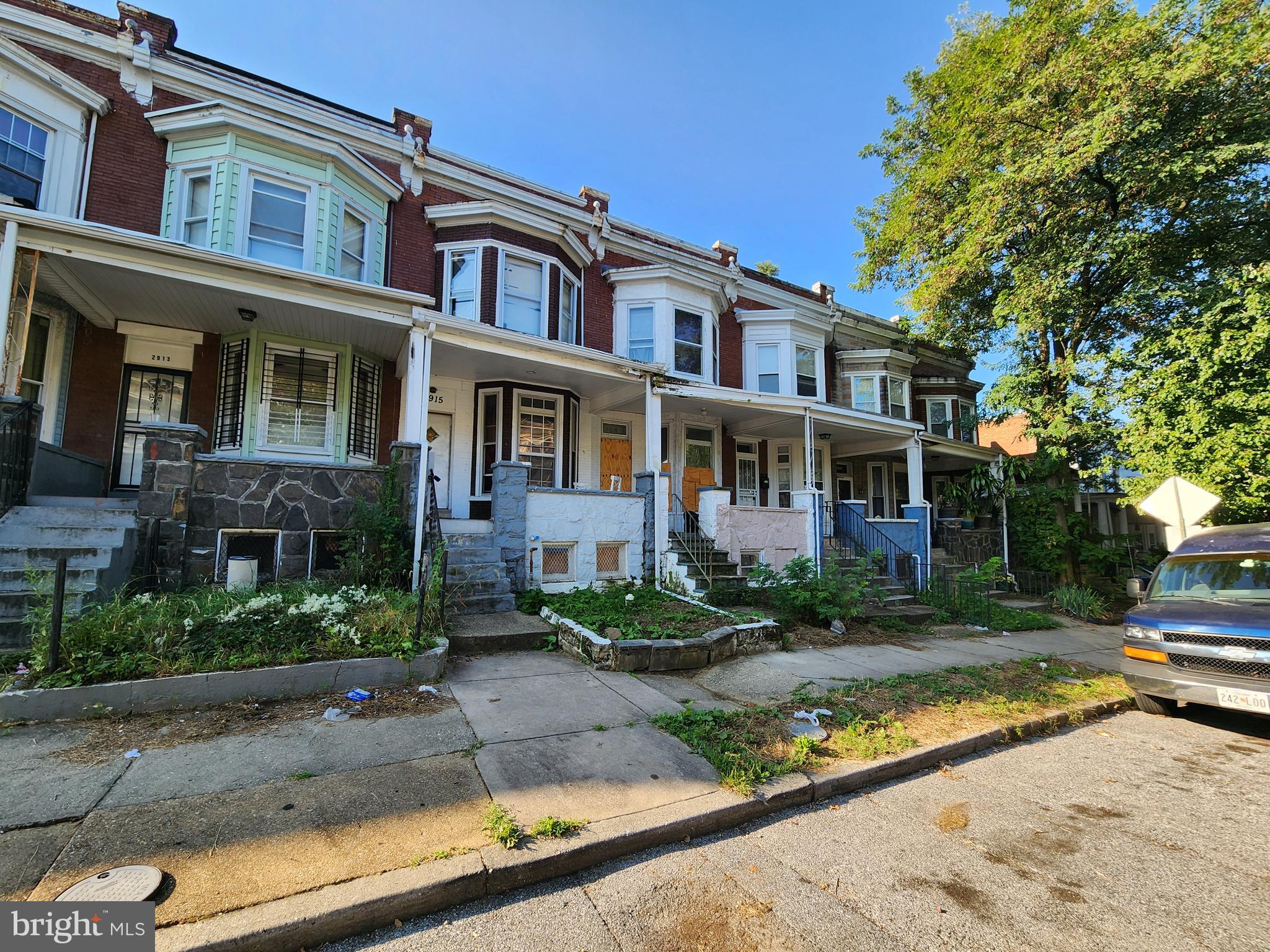 2915 Mosher Street Baltimore, MD 21216 - Photo 2 of 3 a front view of a house with garden