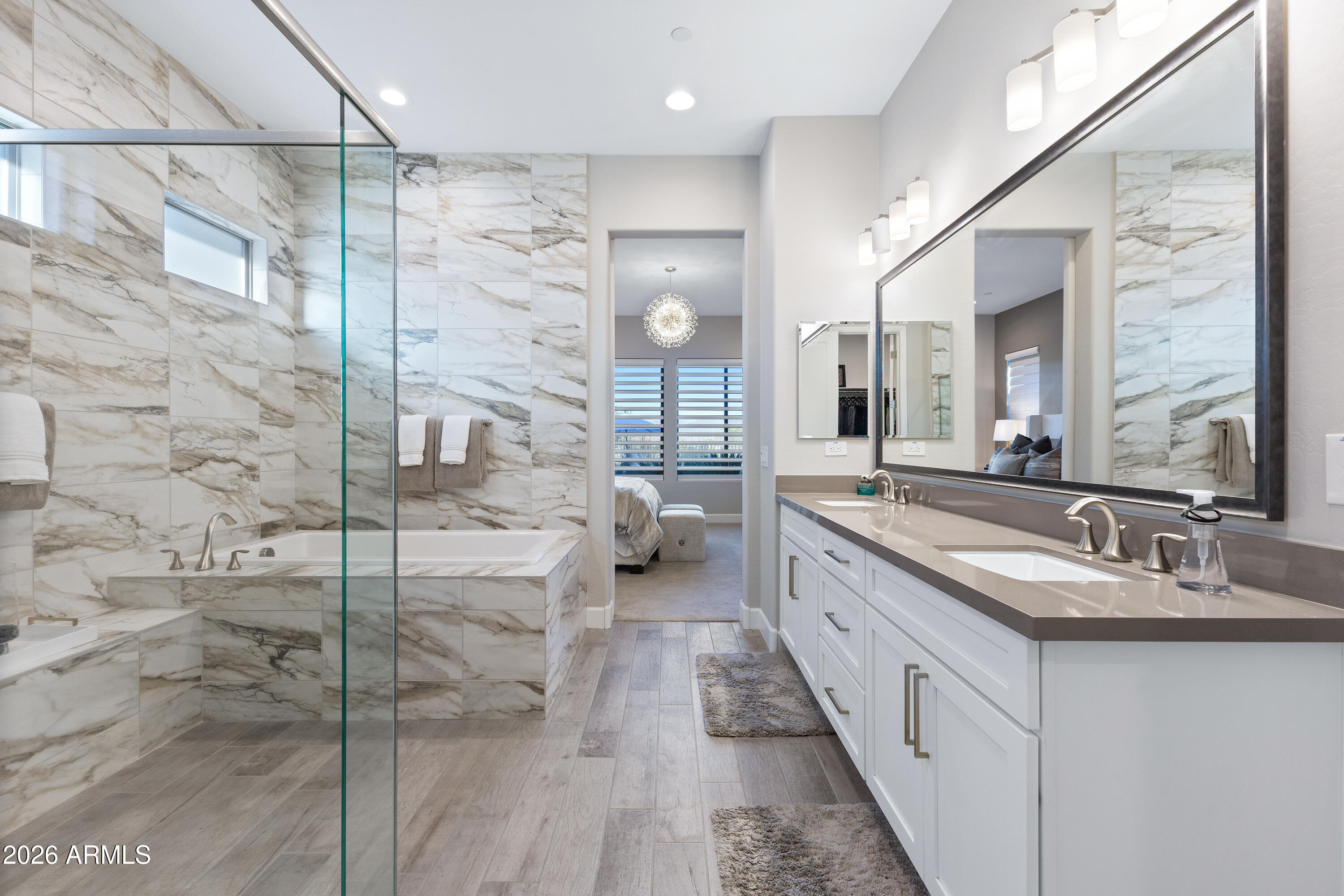 28803 North Sandal Court Rio Verde, AZ 85263 - Photo 29 of 85 a bathroom with a double vanity sink and mirror