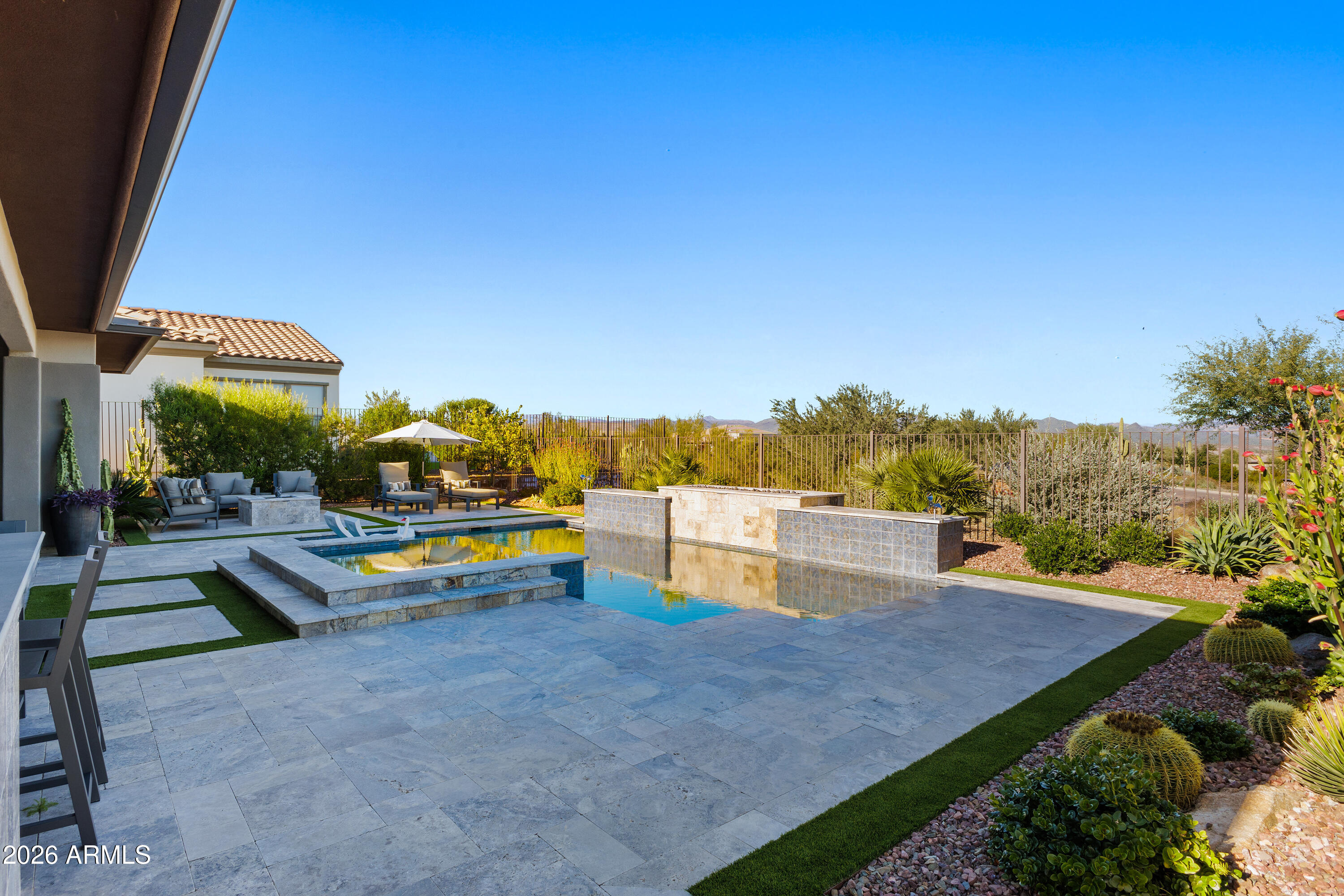 28803 North Sandal Court Rio Verde, AZ 85263 - Photo 45 of 85 a view of a swimming pool with a patio and a yard