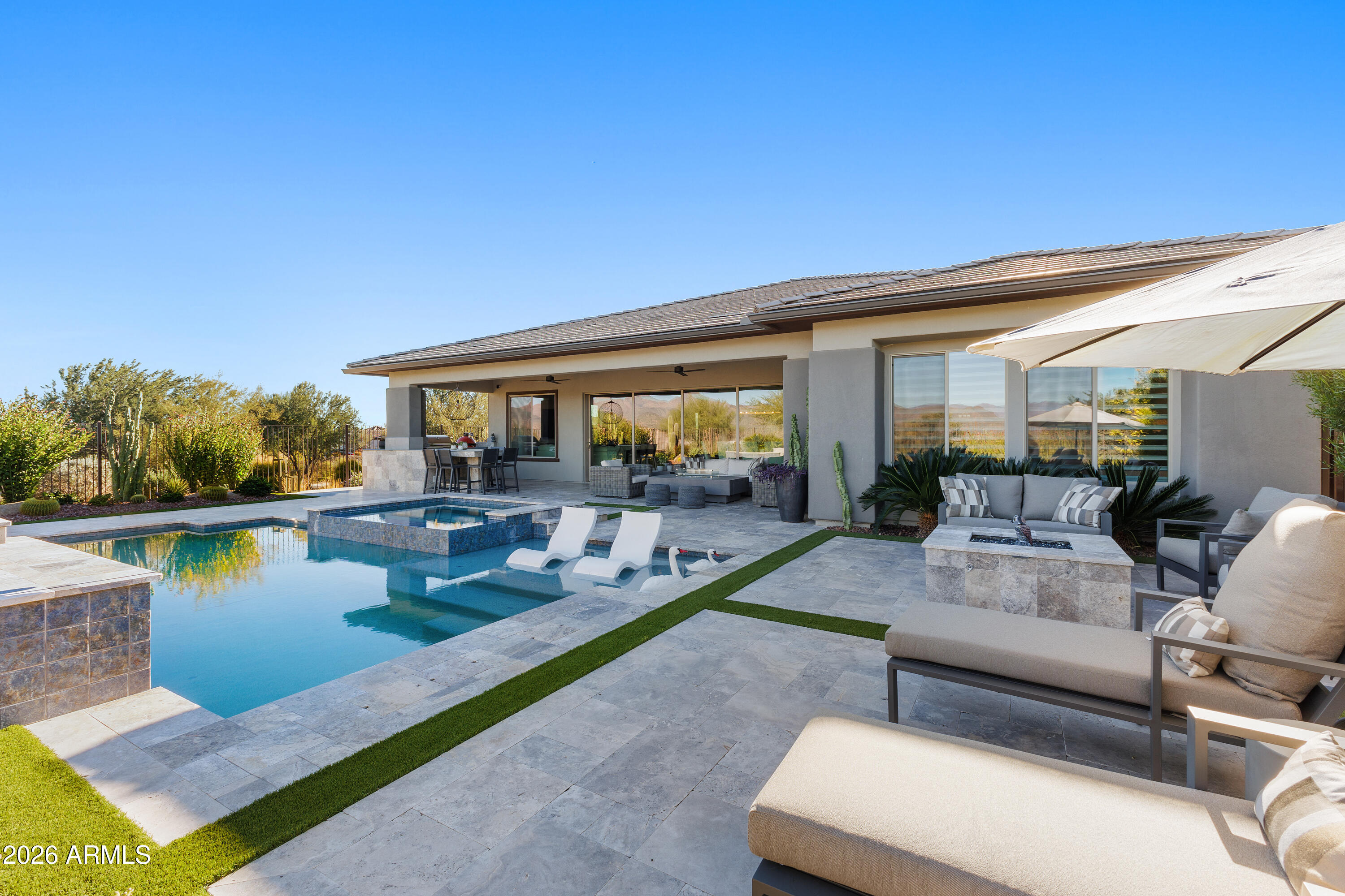 28803 North Sandal Court Rio Verde, AZ 85263 - Photo 48 of 85 a swimming pool with outdoor seating and yard
