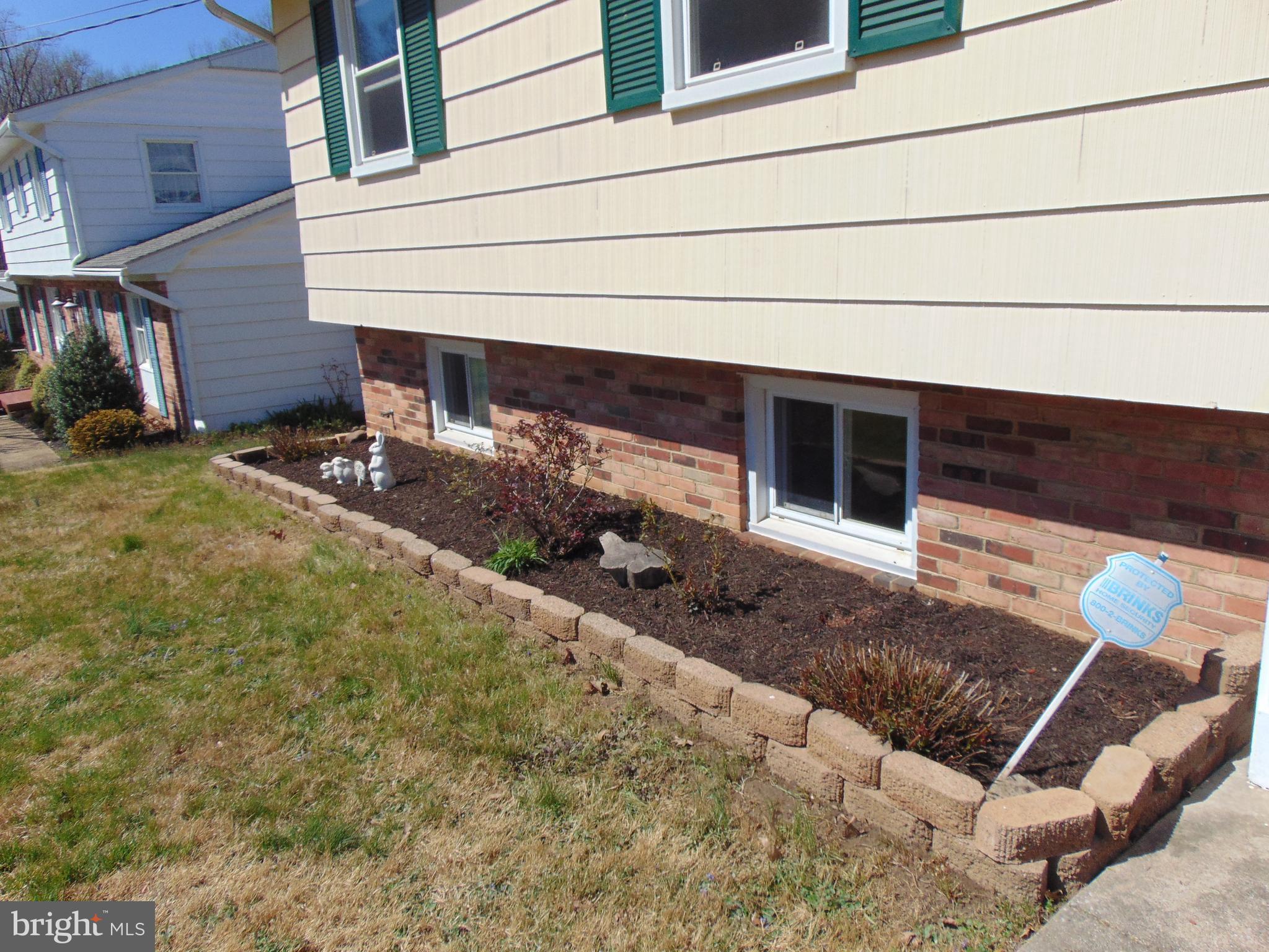 760 Hawthorne Road Linthicum Heights, MD 21090 - Photo 3 of 82 Front flower beds to the left of the front door.