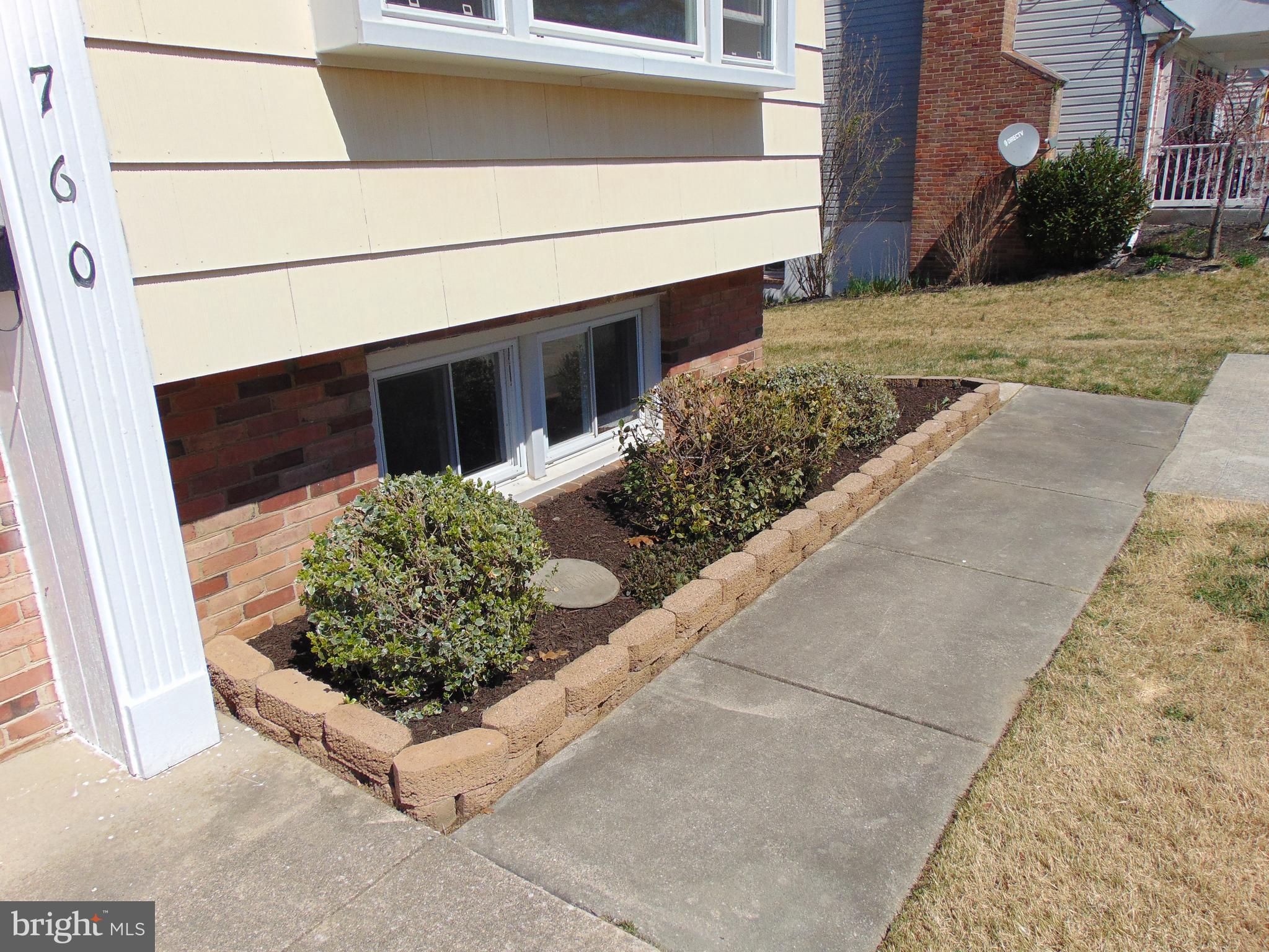 760 Hawthorne Road Linthicum Heights, MD 21090 - Photo 4 of 82 Front flowerbed to the right side of front door.