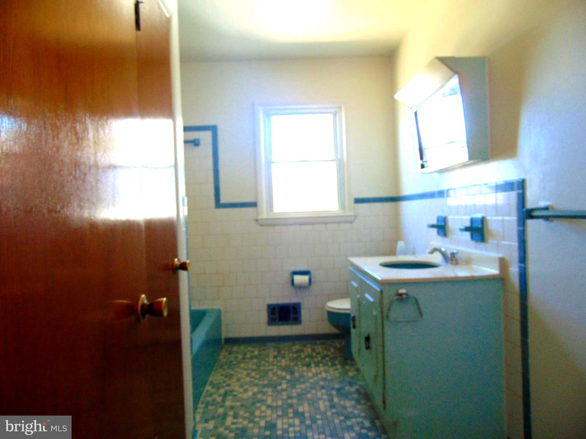 760 Hawthorne Road Linthicum Heights, MD 21090 - Photo 34 of 82 Upstairs full bath. Very cool retro tile work.