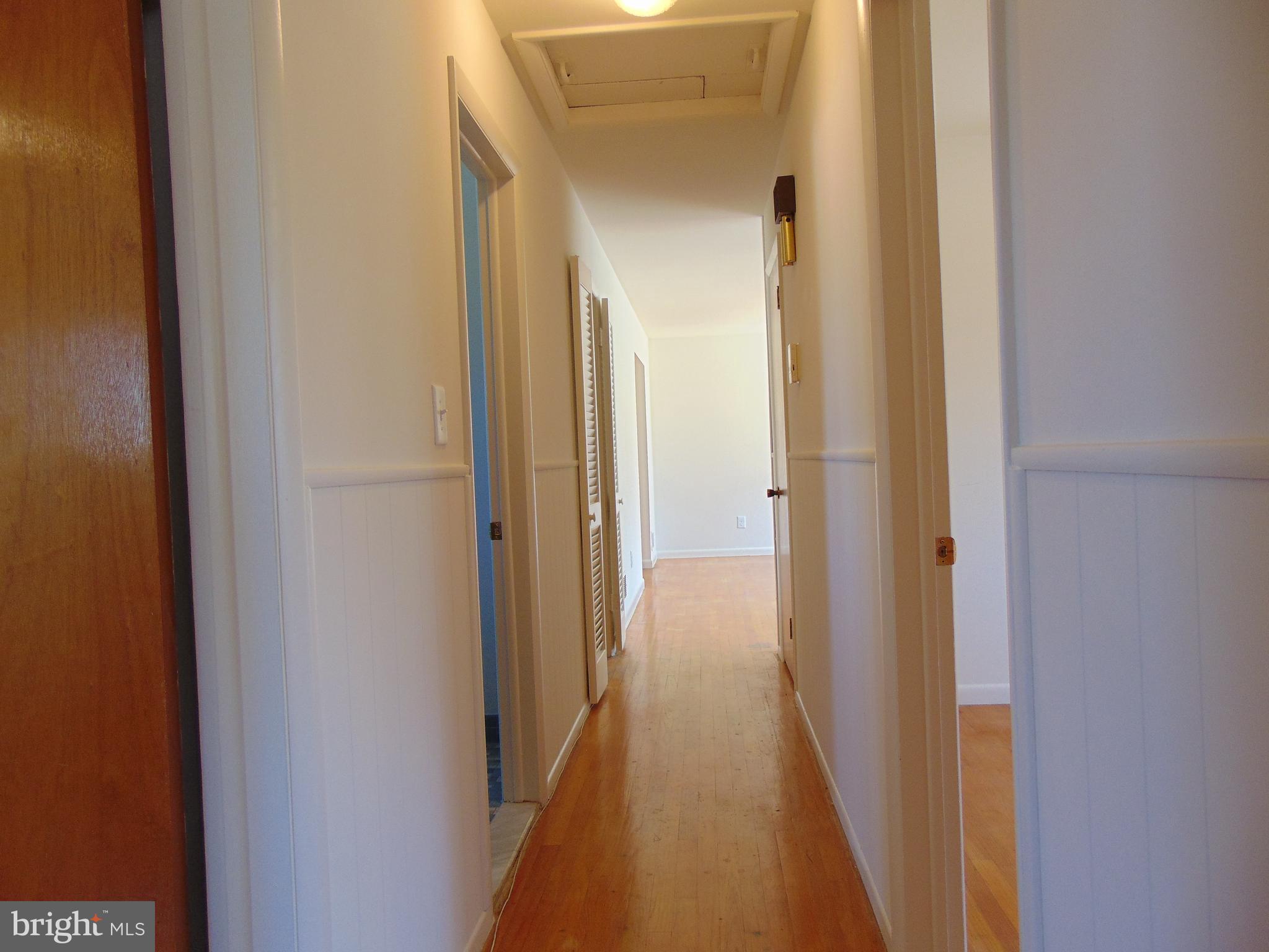 760 Hawthorne Road Linthicum Heights, MD 21090 - Photo 48 of 82 View of upstairs hallway looking into living room.