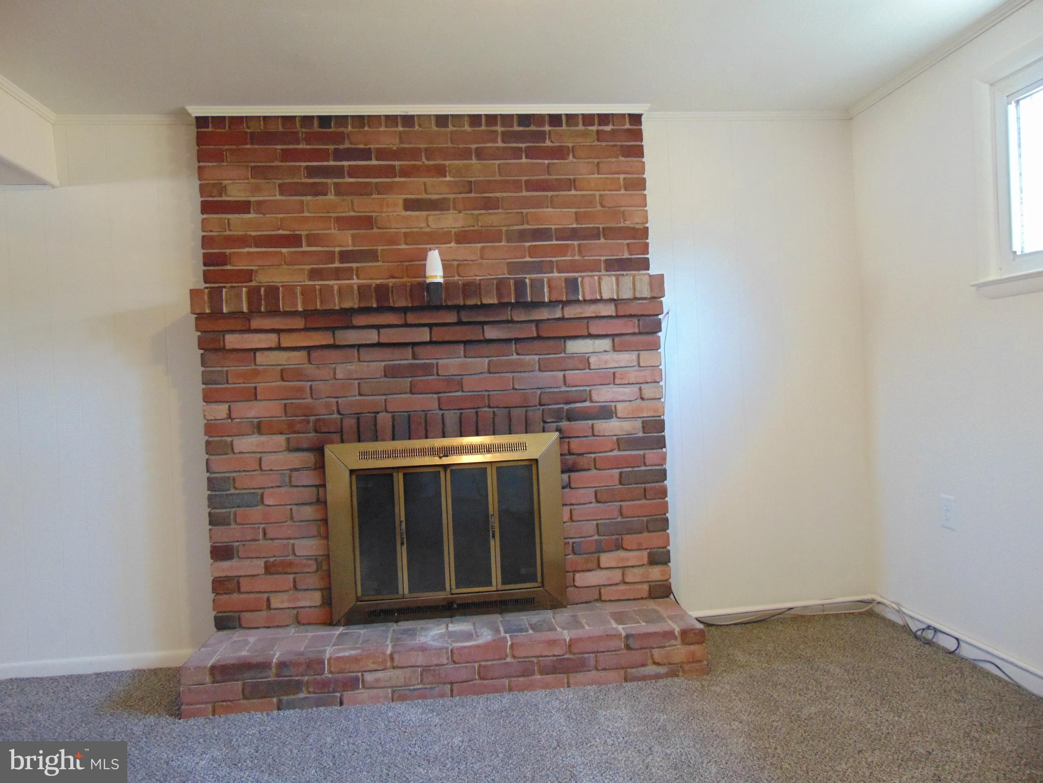 760 Hawthorne Road Linthicum Heights, MD 21090 - Photo 54 of 82 Gas fireplace in basement not working needs work