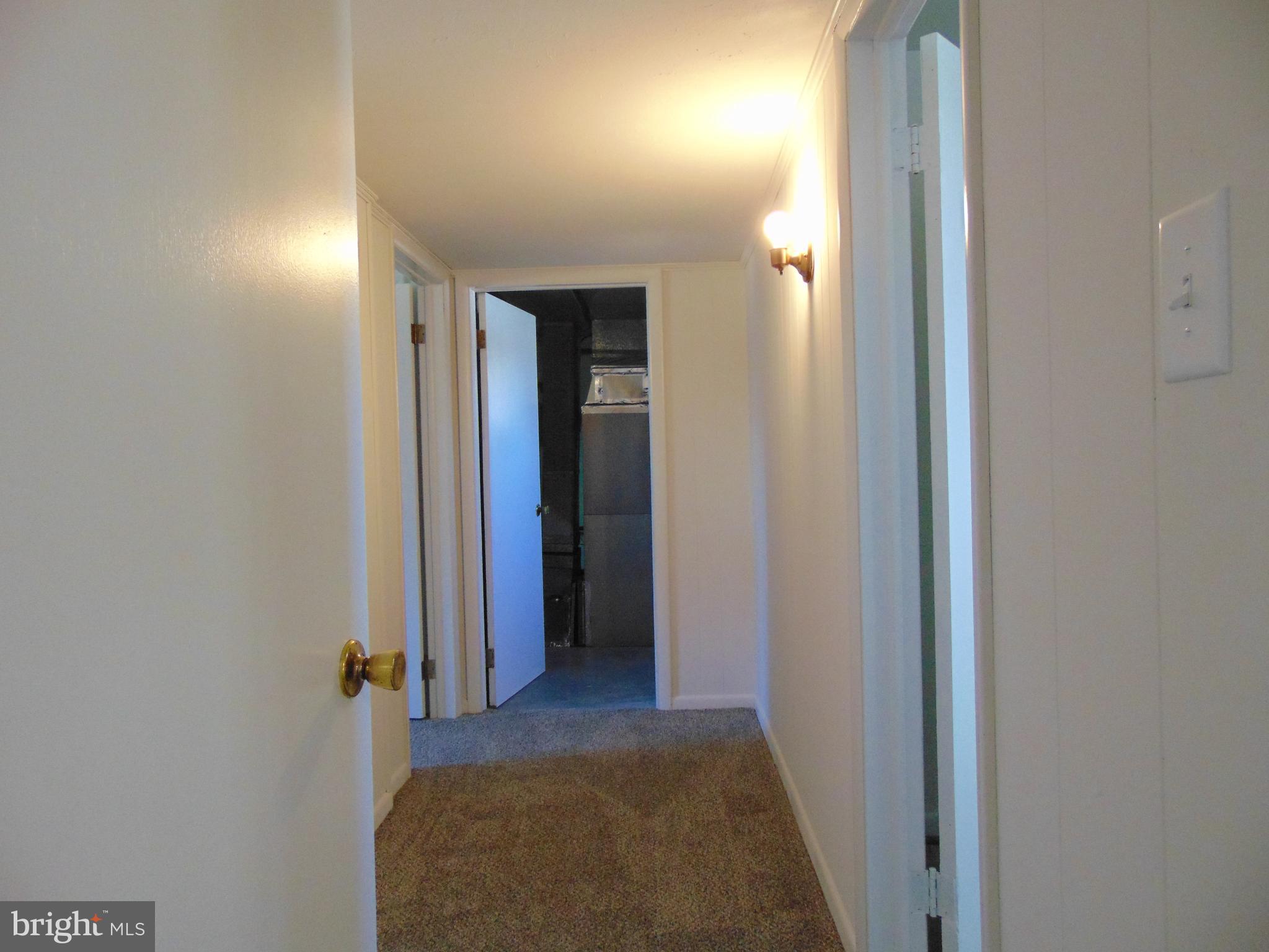 760 Hawthorne Road Linthicum Heights, MD 21090 - Photo 56 of 82 Hallway in basement leading to 4th bedroom, bath