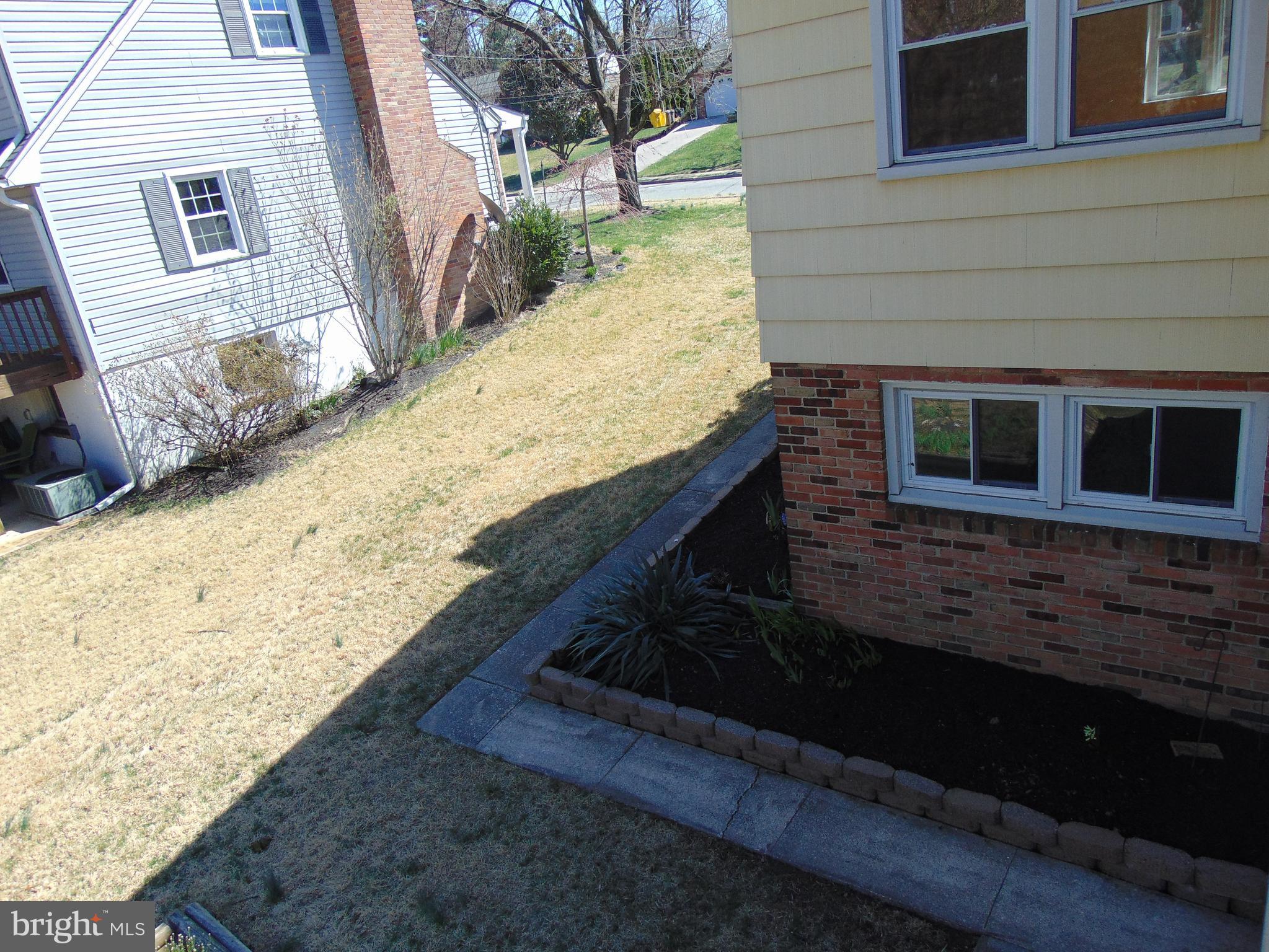 760 Hawthorne Road Linthicum Heights, MD 21090 - Photo 8 of 82 Back of home. View of walkway from driveway.