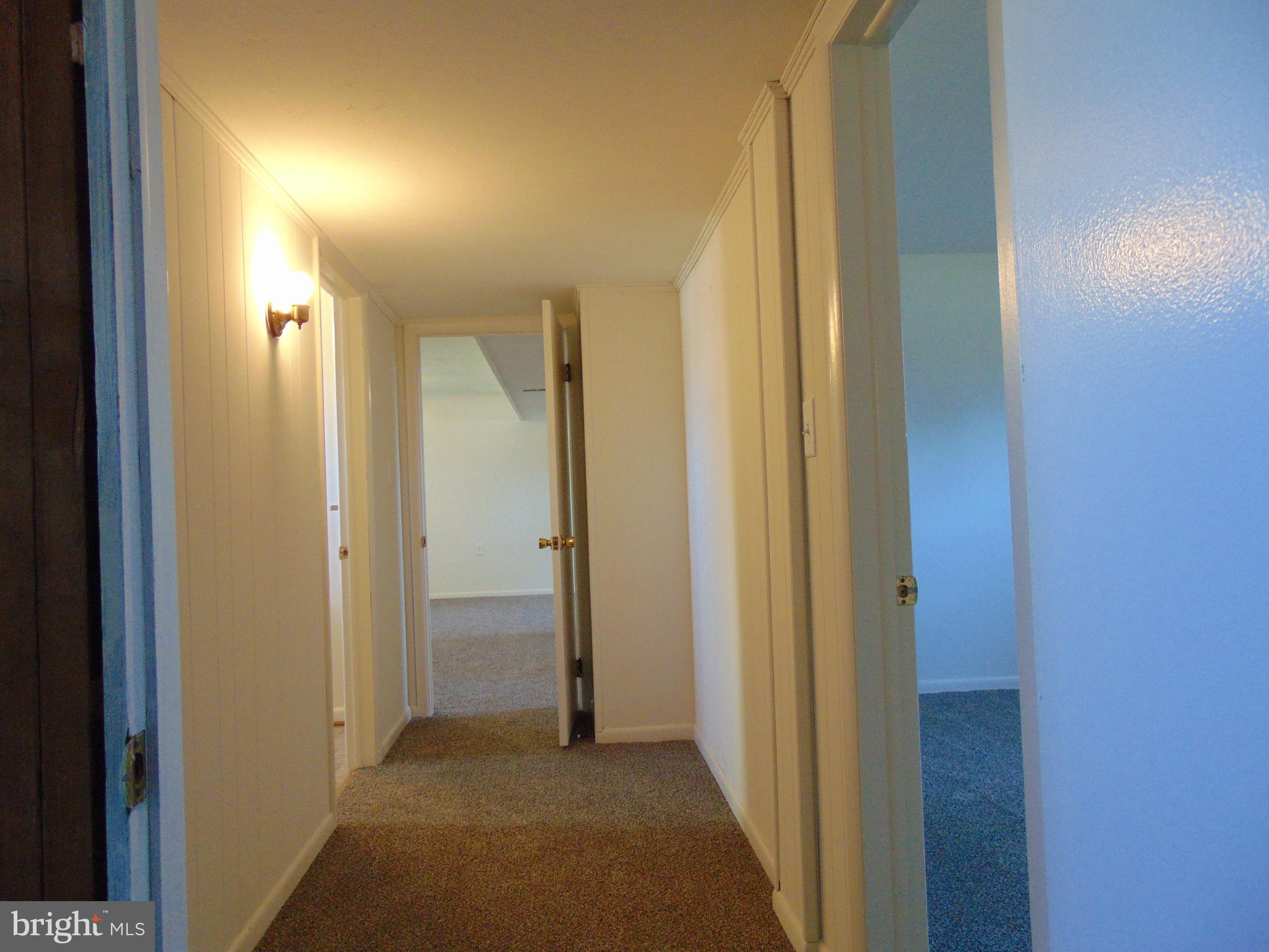 760 Hawthorne Road Linthicum Heights, MD 21090 - Photo 74 of 82 Basement hallway looking into F/R 4th B/R on Lft