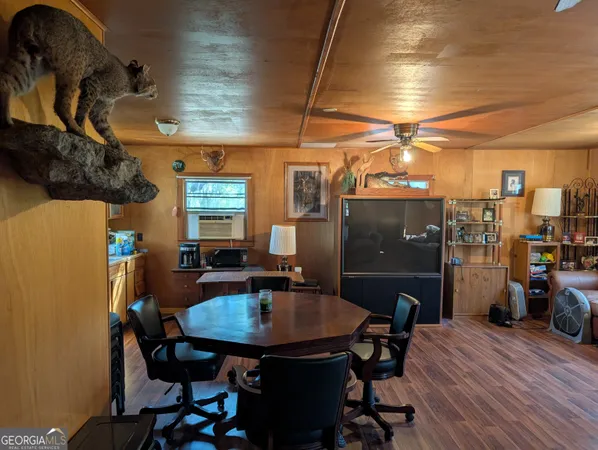 a white toilet sitting next to a shower