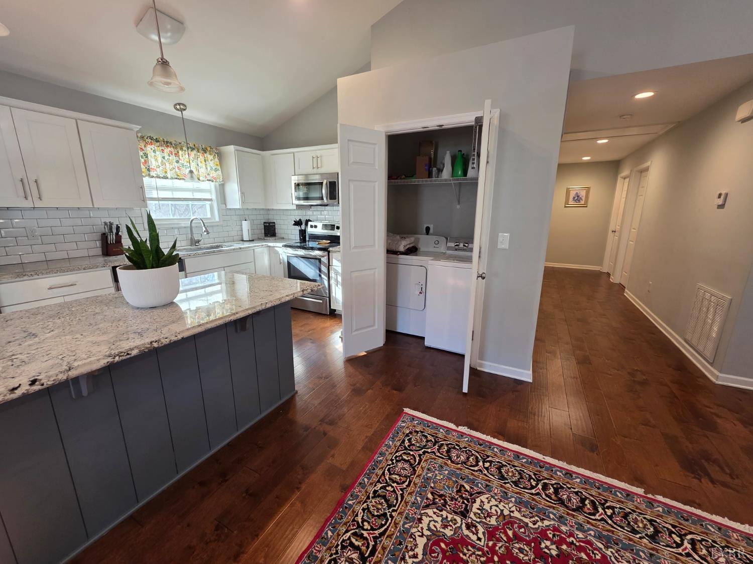 424 Patrick Street Lynchburg, VA 24501 - Photo 12 of 30 a kitchen with sink and refrigerator
