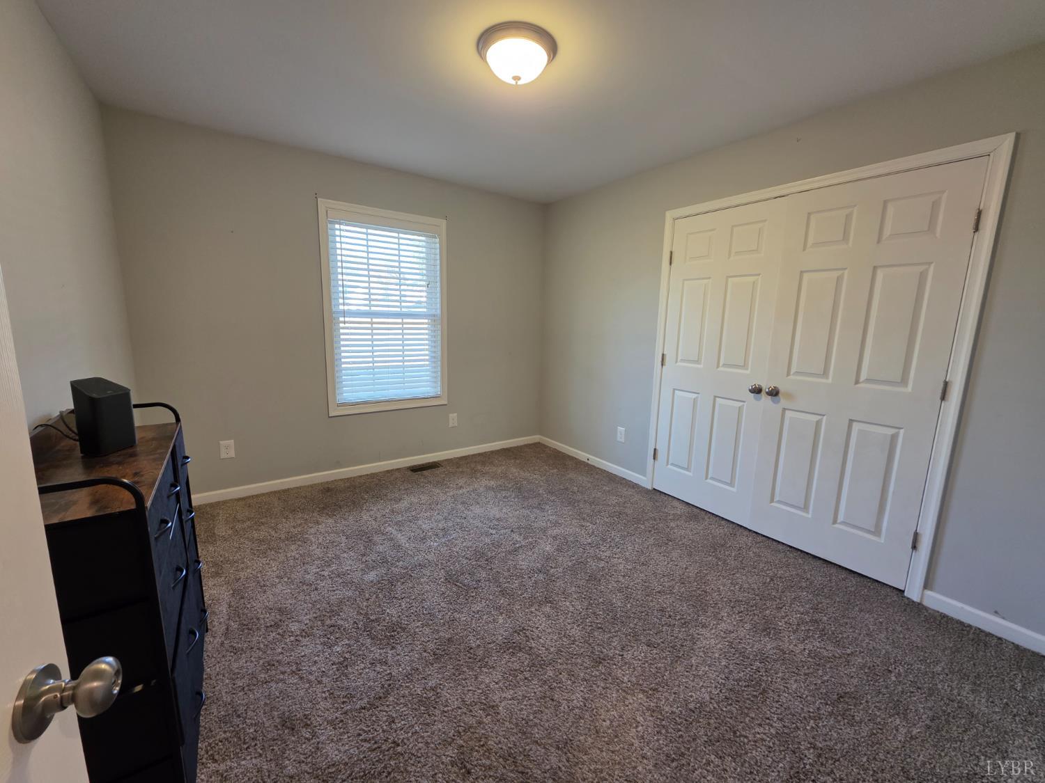 424 Patrick Street Lynchburg, VA 24501 - Photo 21 of 30 a view of a workspace with furniture and a window