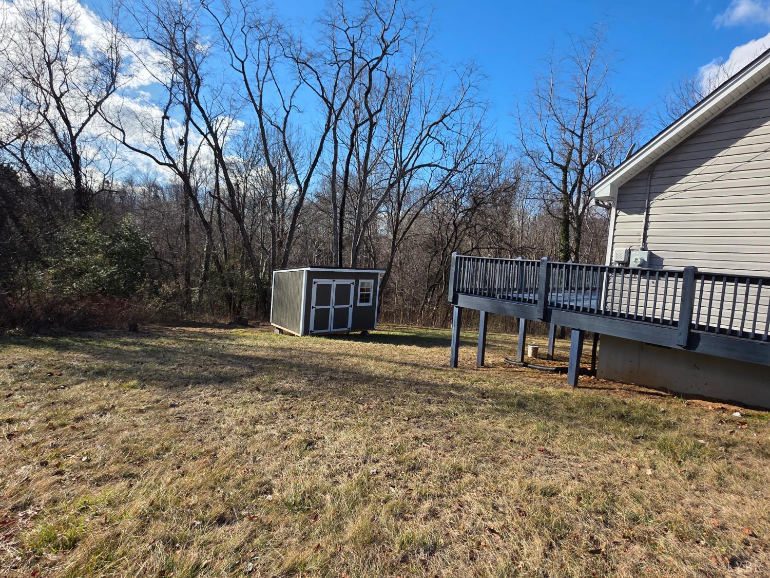 424 Patrick Street Lynchburg, VA 24501 - Photo 26 of 30 a white bench sitting in the middle of a yard