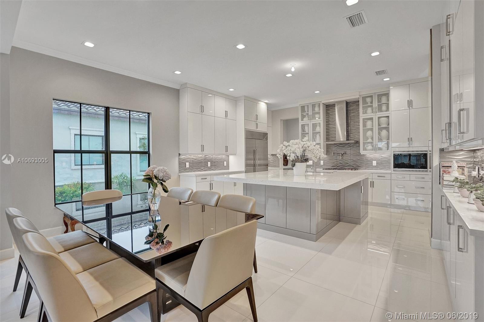 17591 Cadena Drive Boca Raton, FL 33496 - Photo 13 of 56 BREAKFAST AREA + KITCHEN