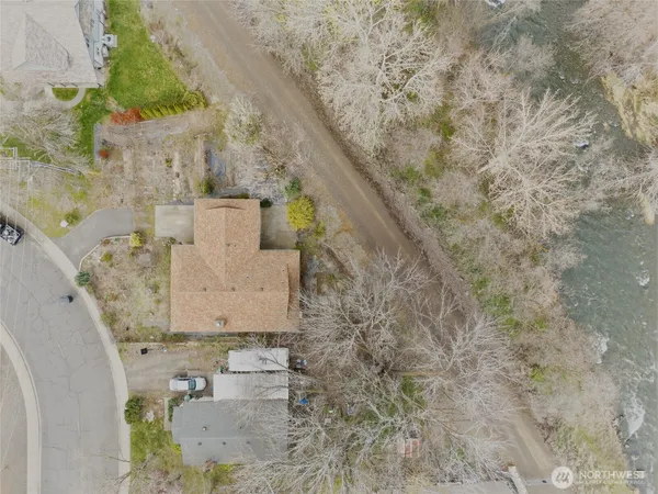 an aerial view of a house with garden