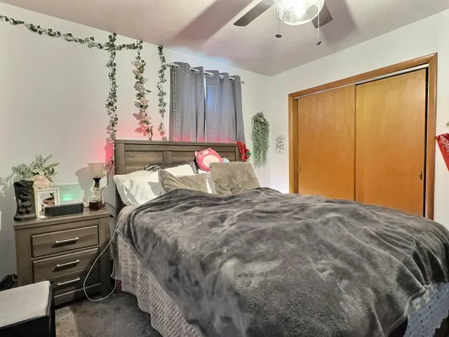 a view of a workspace with furniture